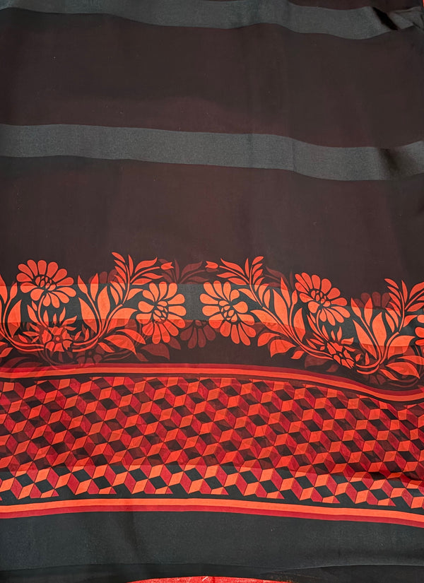 The Vritika Riva: Jet Black & Crimson Satin Border Printed Saree