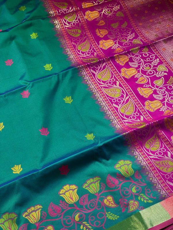 The Morpankhi Medallion: Peacock Blue Silk Saree with Rani Pink & Gold Border