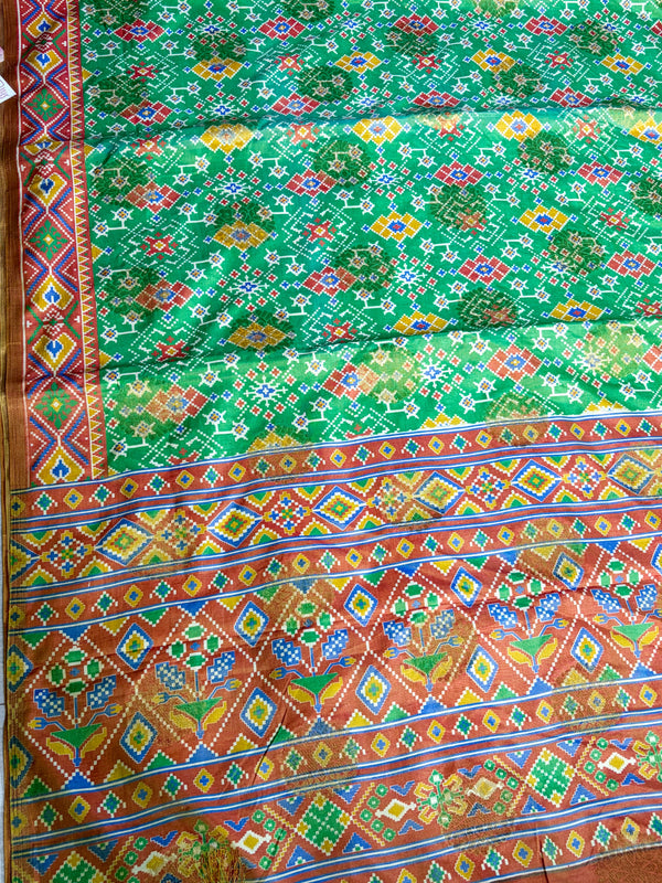 The Meenakshi Vilasa: Emerald Green Patola & Bandhani Saree