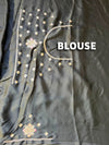 The Kaashvi Riva: Midnight Black Georgette Saree with Embroidered Scallop Border