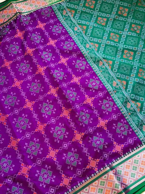 The Vaishnavi Riva: Royal Purple & Emerald Green Patola Printed Saree