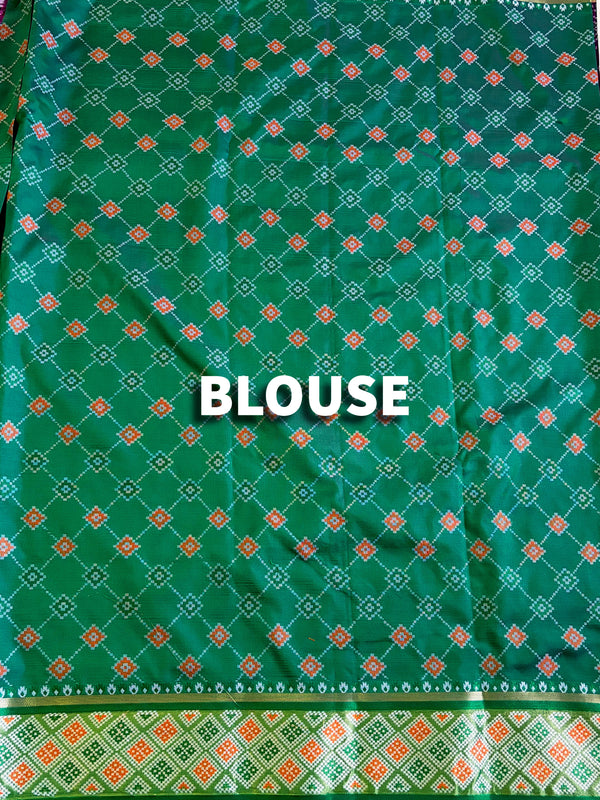 The Vaishnavi Riva: Royal Purple & Emerald Green Patola Printed Saree