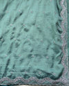The Sage Horizon: Sea Green Textured Georgette Saree with Scalloped Moti & Cutdana Work Border