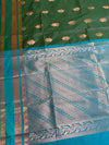 The Emerald Court: Forest Green Silk Saree with Turquoise Contrast Pallu