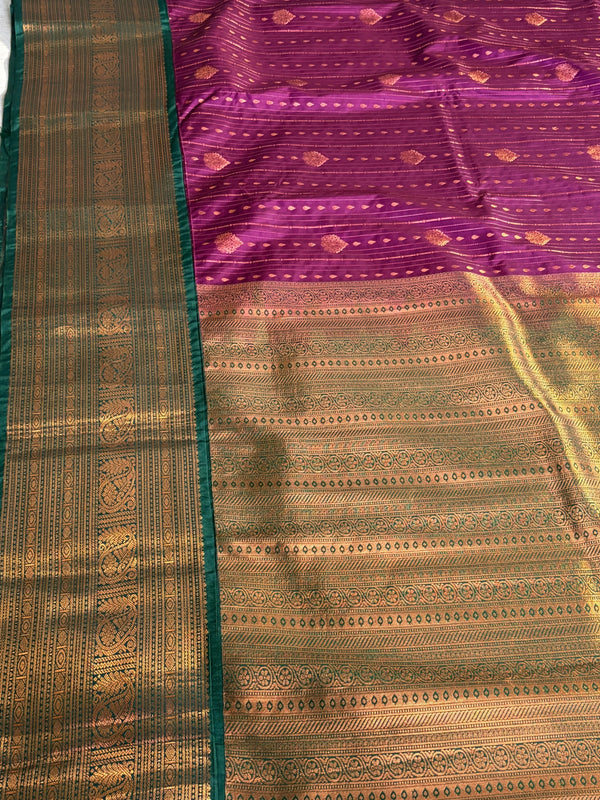 The Amethyst Temple: Deep Plum Kanchipuram Silk Saree with Emerald & Gold Border