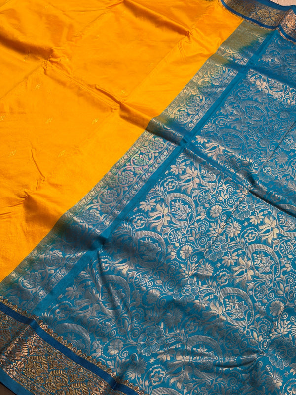 The Summer Sun: Lemon Yellow Silk Saree with Cerulean Blue Border