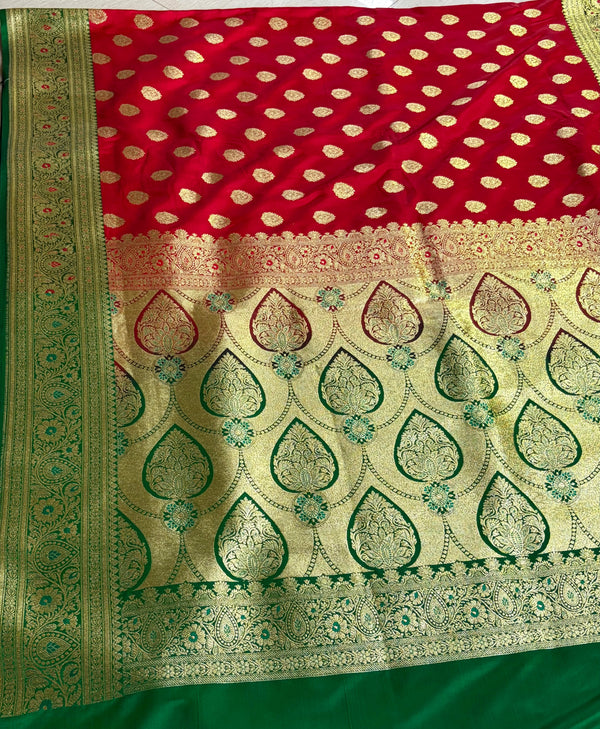 Red silk, green borders, and timeless vibes.
