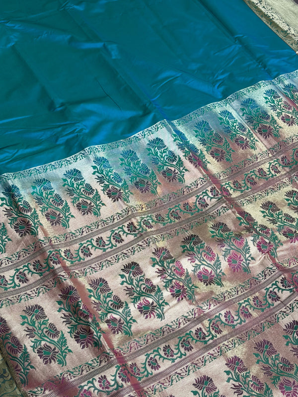 The Sapphire Serenity: Teal Blue Silk Saree with Floral Meenakari Pallu