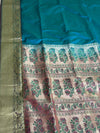 The Sapphire Serenity: Teal Blue Silk Saree with Floral Meenakari Pallu