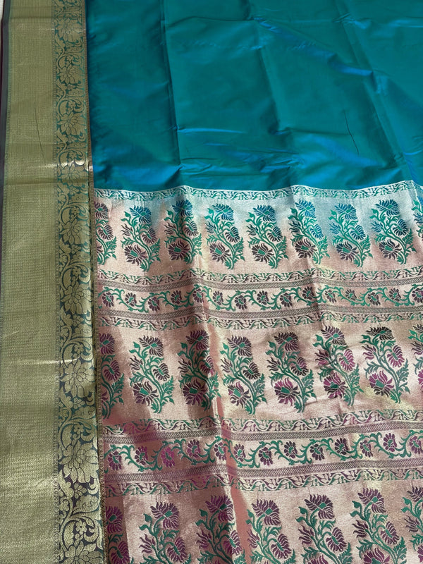 The Sapphire Serenity: Teal Blue Silk Saree with Floral Meenakari Pallu