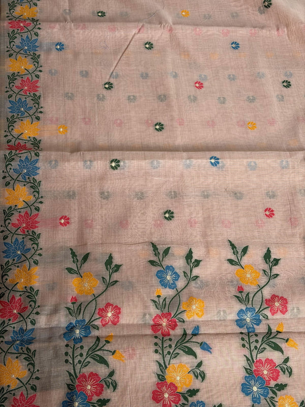 Soft pink linen saree with a charming floral border — light, fresh, and elegant