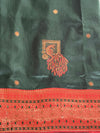 Elegant green saree with a rich red border and delicate diamond work — a perfect blend of tradition and sparkle.