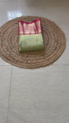 The Vasundhara Vilasa: Sage Green & Coral Red Kanchipuram Tissue Silk Saree