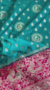 The Empress Teal: Teal Blue Banarasi Katan Silk Saree with Crimson Shikargah Border & Swarovski Crystals