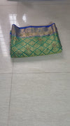 The Mayura Vilasa: Teal Green & Royal Blue Woven Banarasi Saree