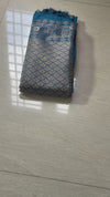 The Indigo Loom: Prussian Blue Raw Silk Saree with Classic Golden Zari Butta Design