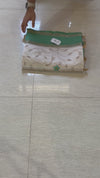 The Sharanya Vilasa: Cream & Teal Green Tussar Silk Cotton Saree