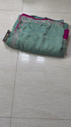 The Sage Horizon: Sea Green Textured Georgette Saree with Scalloped Moti & Cutdana Work Border