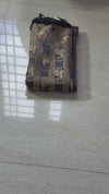 The Charcoal Loom: Midnight Gray Raw Silk Saree with Antique Golden Zari Shikargah Pallu