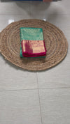 The Emerald Ira: Sea Green & Rani Pink Kanchipuram Silk Saree